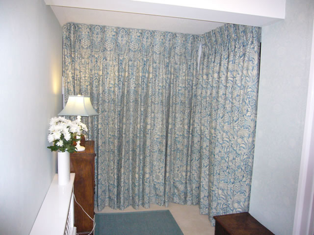 Blue floor length curtains